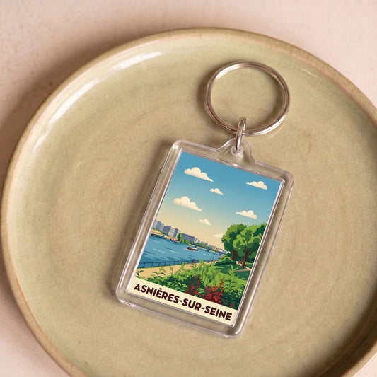 Porte-clés souvenir de la ville de Asnières-sur-Seine avec une illustration stylisée.