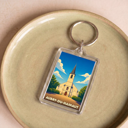 Porte-clés souvenir de la ville d'Aubry-du-Hainaut avec une illustration stylisée de son église.