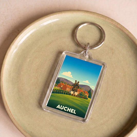 Porte-clés souvenir de la ville de Auchel avec une illustration stylisée.
