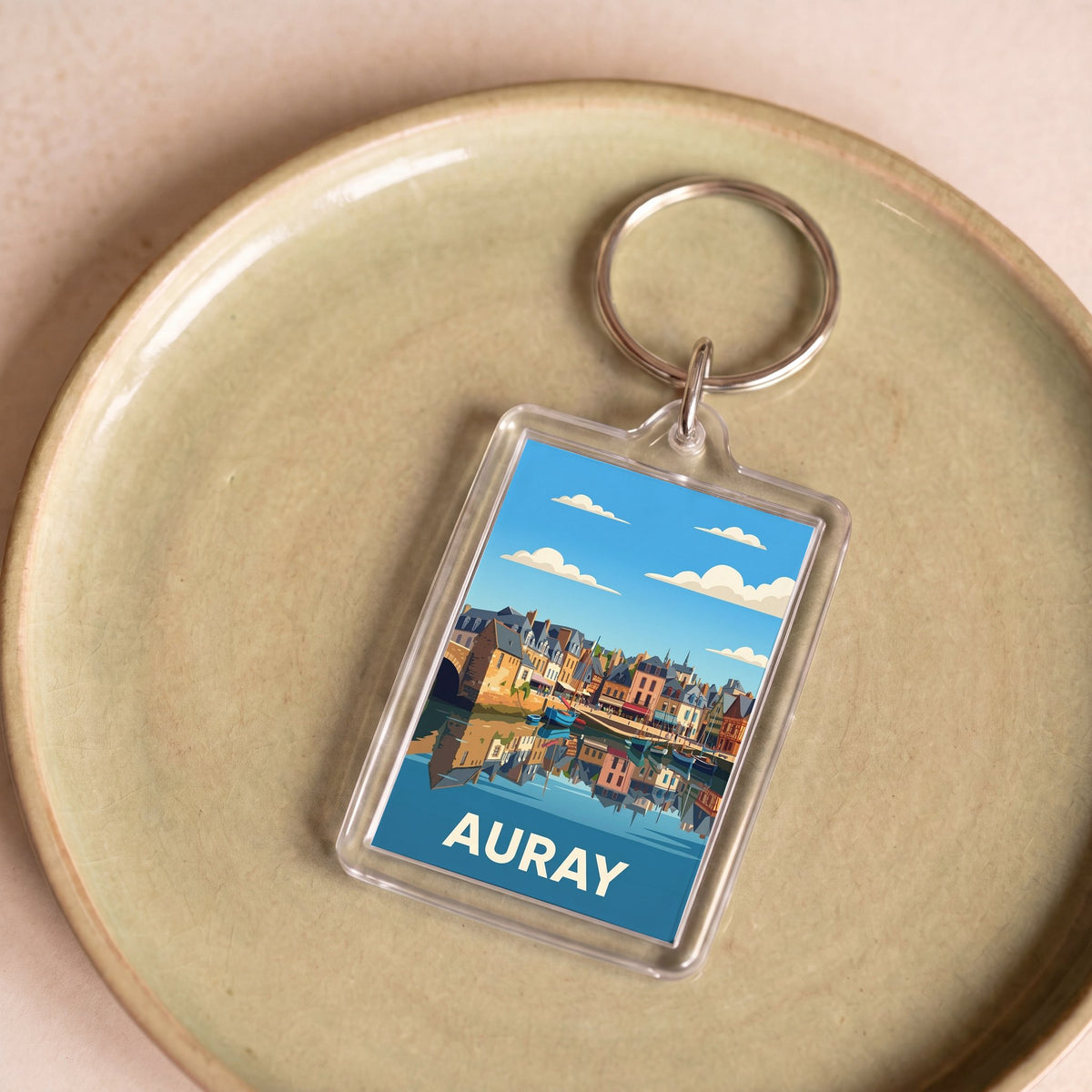 Porte-clés souvenir de la ville d'Auray avec une illustration stylisée.