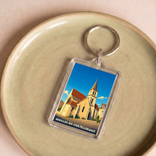 Porte-clés souvenir de la ville de Availles-en-Châtellerault avec une illustration stylisée de son église.