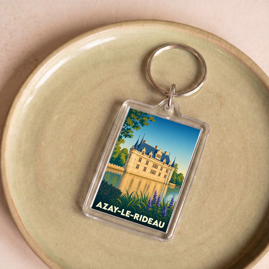Porte-clés souvenir de la ville d'Azay-le-Rideau avec une illustration stylisée de son château.