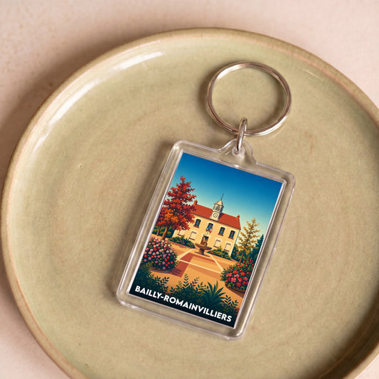 Porte-clés souvenir de la ville de Bailly-Romainvilliers avec une illustration stylisée.