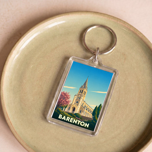Porte-clés souvenir de la ville de Barenton avec une illustration stylisée de son église.