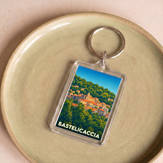 Porte-clés souvenir de la ville de Bastelicaccia avec une illustration stylisée.