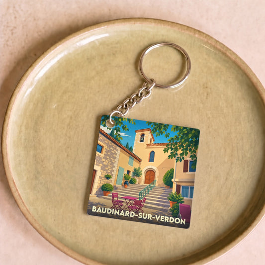 Porte-clés souvenir de la ville de Baudinard-sur-Verdon avec une illustration stylisée.