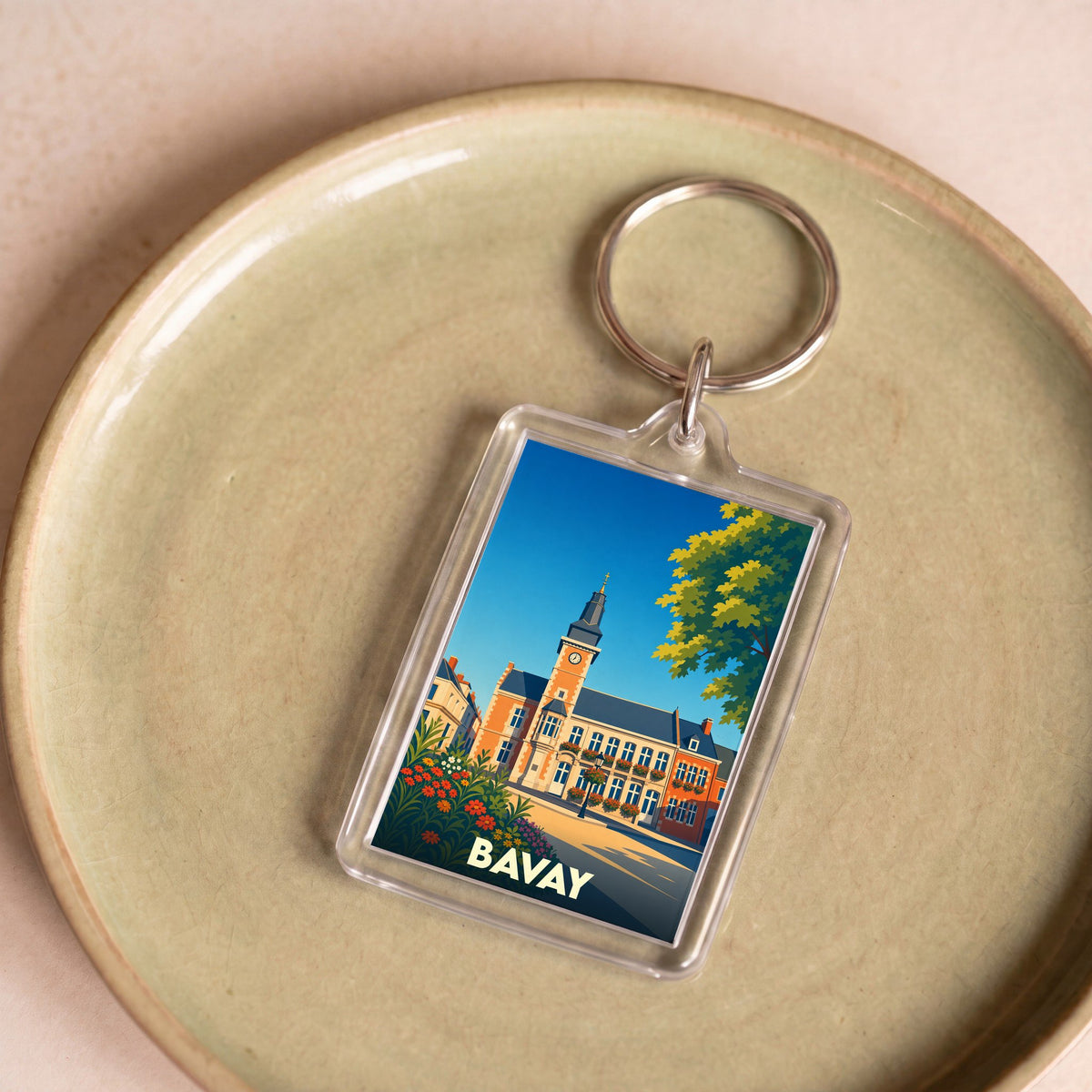Porte-clés souvenir de la ville de Bavay avec une illustration stylisée de son hôtel de ville.