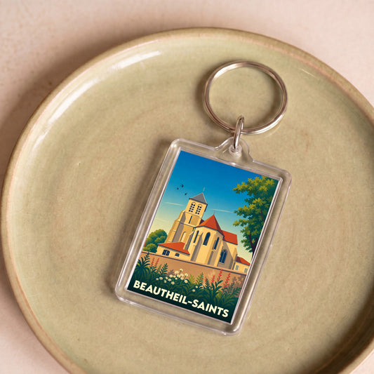 Porte-clés souvenir de la ville de Beautheil-Saints avec une illustration stylisée de son église.