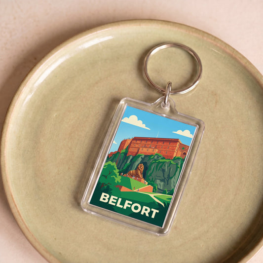 Porte-clés souvenir de la ville de Belfort avec une illustration stylisée.