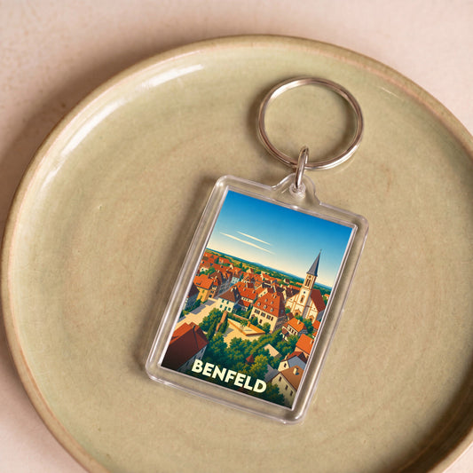 Porte-clés souvenir de la ville de Benfeld avec une illustration stylisée.