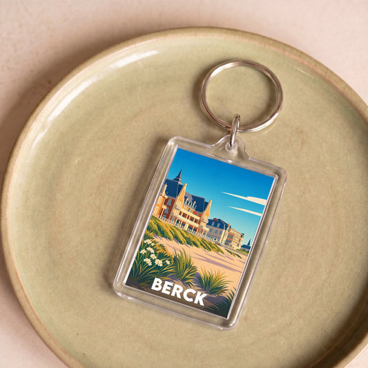Porte-clés souvenir de la ville de Berck avec une illustration stylisée.