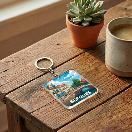 Porte-clés souvenir de la ville de Bergues avec une illustration stylisée.