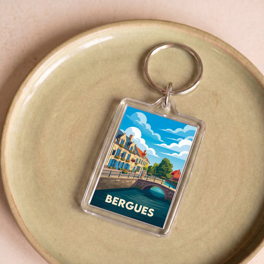 Porte-clés souvenir de la ville de Bergues avec une illustration stylisée.
