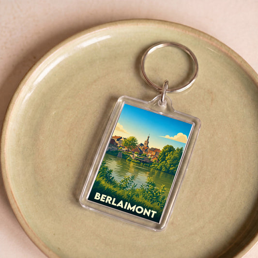 Porte-clés souvenir de la ville de Berlaimont avec une illustration stylisée.