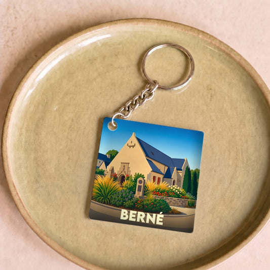 Porte-clés souvenir de la ville de Berné avec une illustration stylisée.