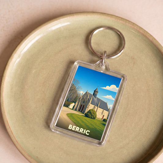Porte-clés souvenir de la ville de Berric avec une illustration stylisée de sa chapelle.