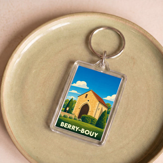 Porte-clés souvenir de la ville de Berry-Bouy avec une illustration stylisée.