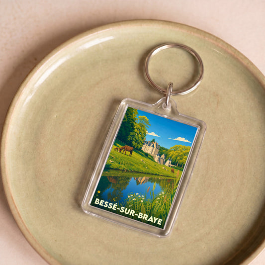 Porte-clés souvenir de la ville de Bessé-sur-Braye avec une illustration stylisée.