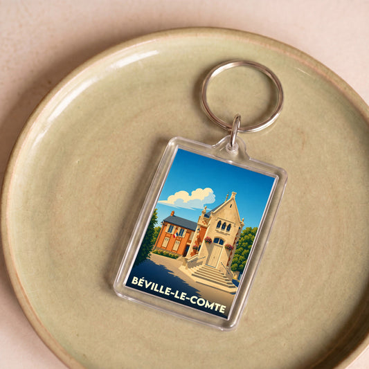 Porte-clés souvenir de la ville de Béville-le-Comte avec une illustration stylisée de sa mairie.