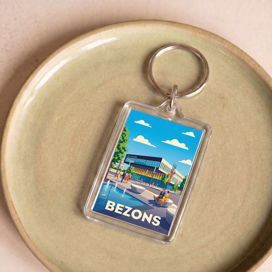 Porte-clés souvenir de la ville de Bezons avec une illustration stylisée.