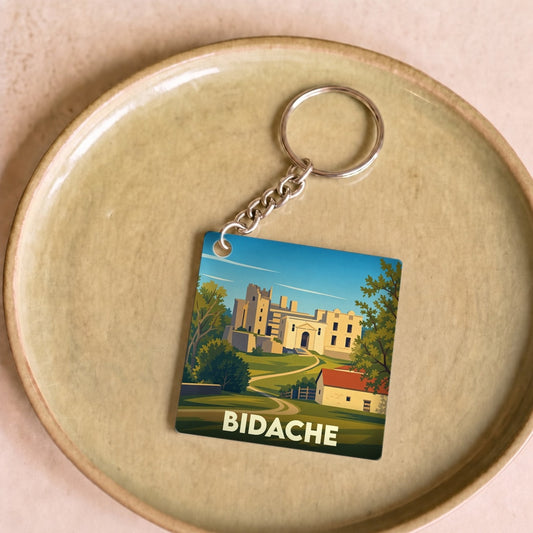Porte-clés souvenir de la ville de Bidache avec une illustration stylisée de son château.