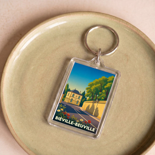 Porte-clés souvenir de la ville de Biéville-Beuville avec une illustration stylisée.