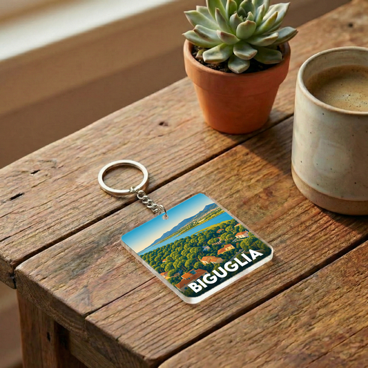 Porte-clés souvenir de la ville de Biguglia avec une illustration stylisée.