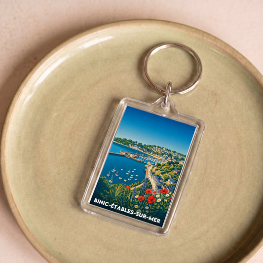 Porte-clés souvenir de la ville de Binic-Étables-sur-Mer avec une illustration stylisée.