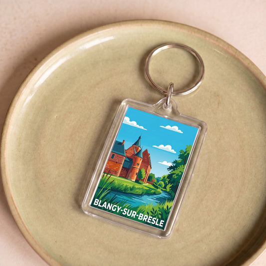 Porte-clés souvenir de la ville de Blangy-sur-Bresle avec une illustration stylisée d'un château.