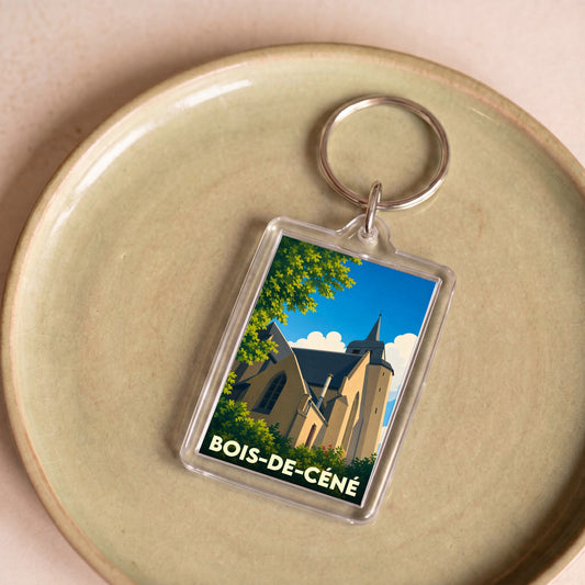 Porte-clés souvenir de la ville de Bois-de-Céné avec une illustration stylisée de son église.