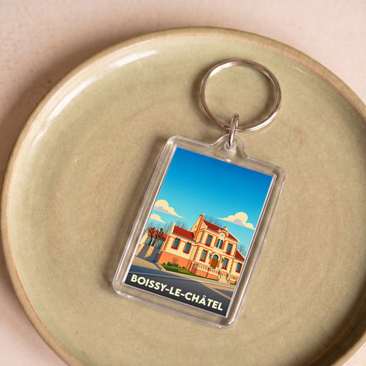 Porte-clés souvenir de la ville de Boissy-le-Châtel avec une illustration stylisée de sa mairie.