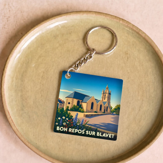 Porte-clés souvenir de la ville de Bon Repos sur Blavet avec une illustration stylisée.