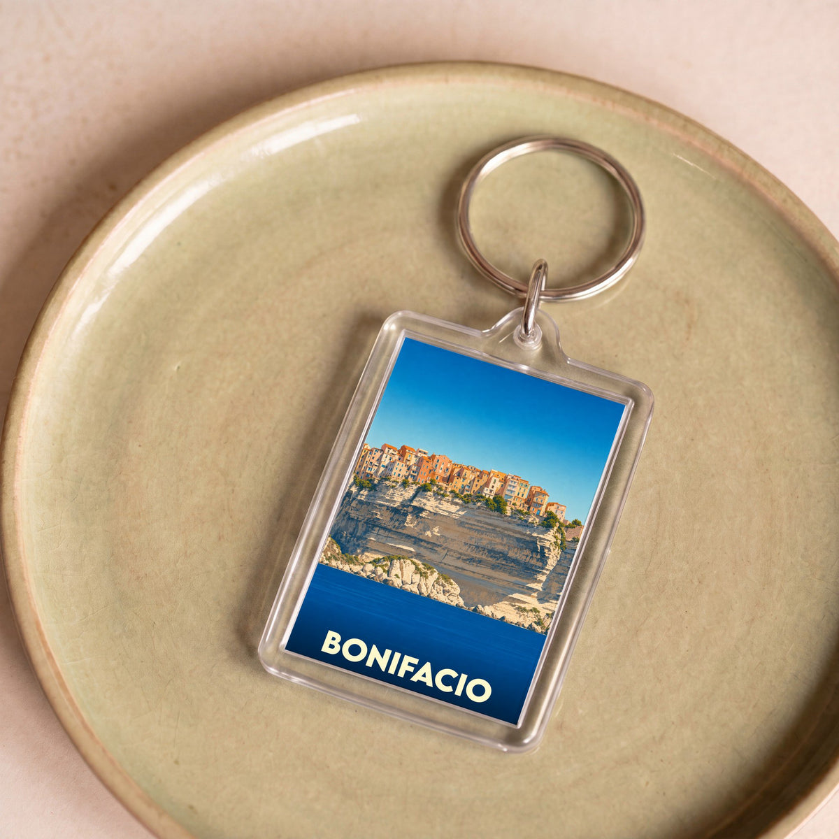 Porte-clés souvenir de la ville de Bonifacio illustré d'une photo de ses célèbres falaises.