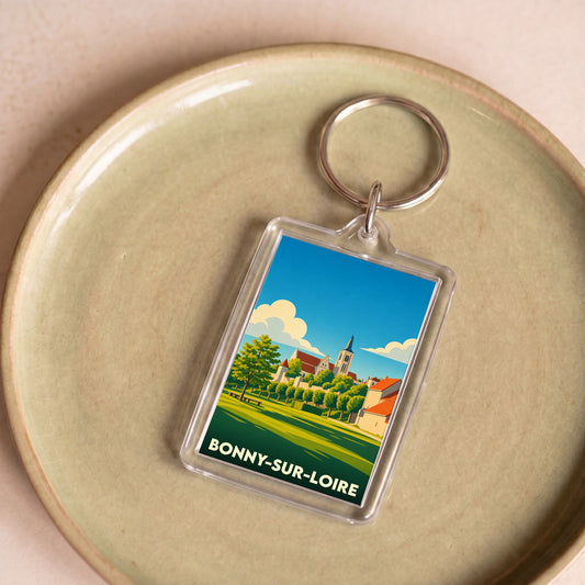 Porte-clés souvenir de la ville de Bonny-sur-Loire avec une illustration stylisée.