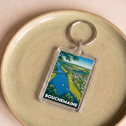 Porte-clés souvenir de la ville de Bouchemaine avec une illustration paysagère stylisée.
