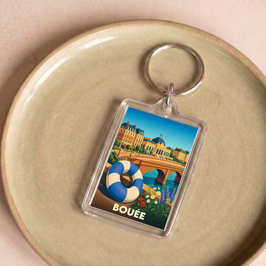 Porte-clés souvenir de la ville de Bouée avec une illustration stylisée.