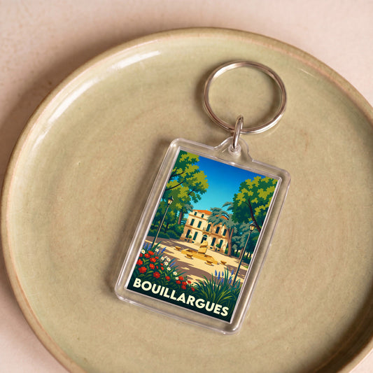 Porte-clés souvenir de la ville de Bouillargues avec une illustration stylisée et colorée.