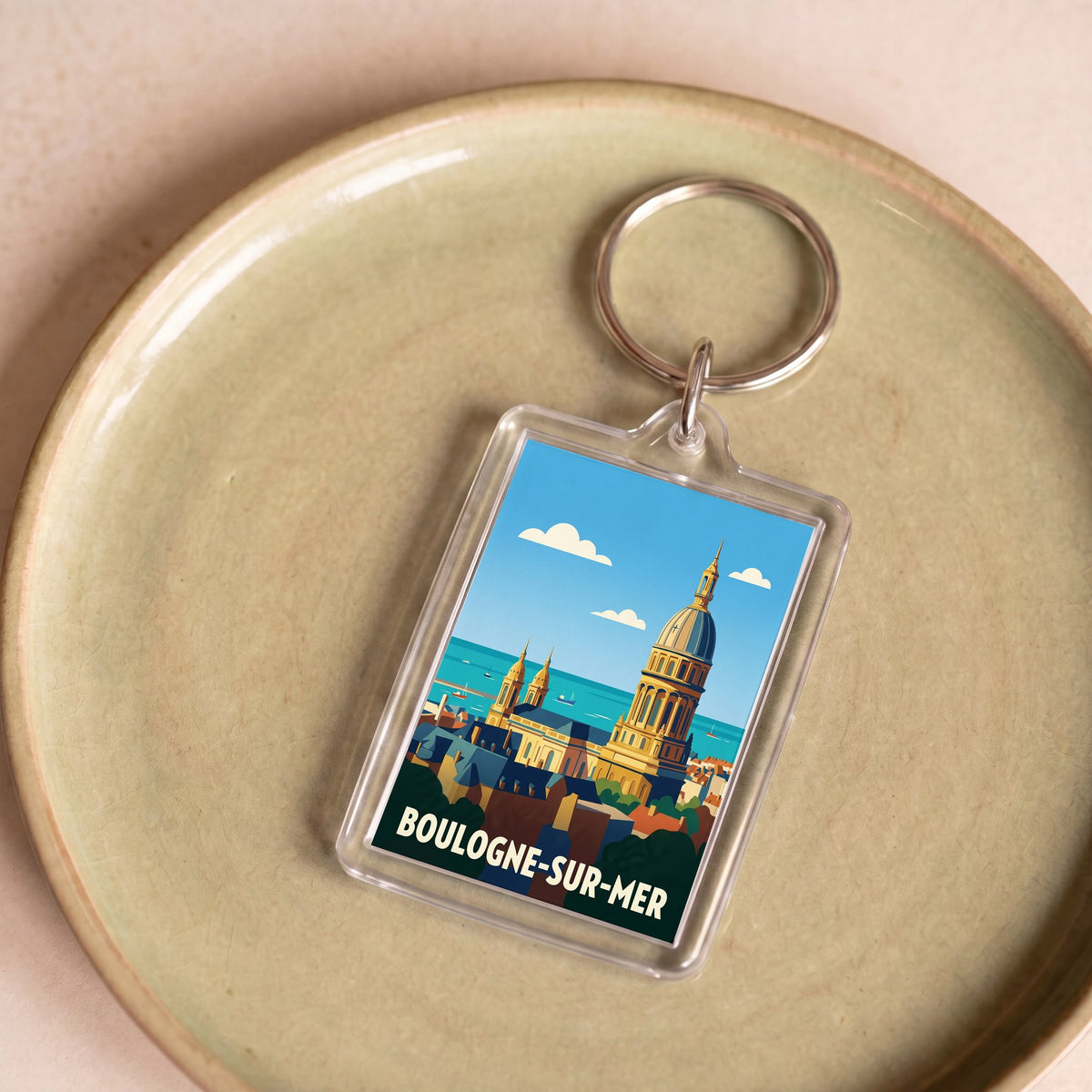 Porte-clés souvenir de la ville de Boulogne-sur-Mer avec une illustration stylisée.