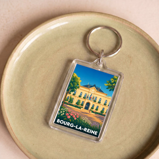 Porte-clés souvenir de la ville de Bourg-la-Reine avec une illustration stylisée.