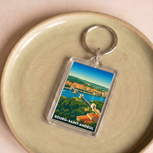 Porte-clés souvenir de la ville de Bourg-Saint-Andéol avec une illustration stylisée.