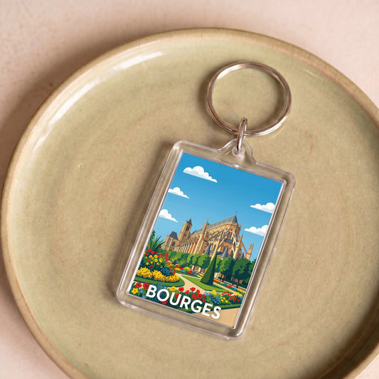Porte-clés souvenir de la ville de Bourges avec une illustration stylisée.