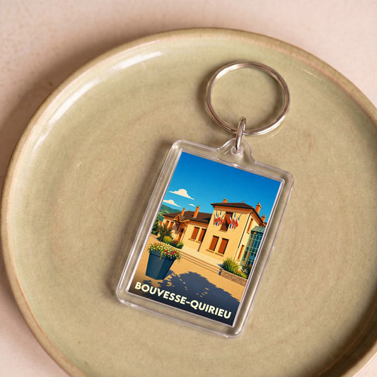 Porte-clés souvenir de la ville de Bouvesse-Quirieu avec une illustration stylisée.