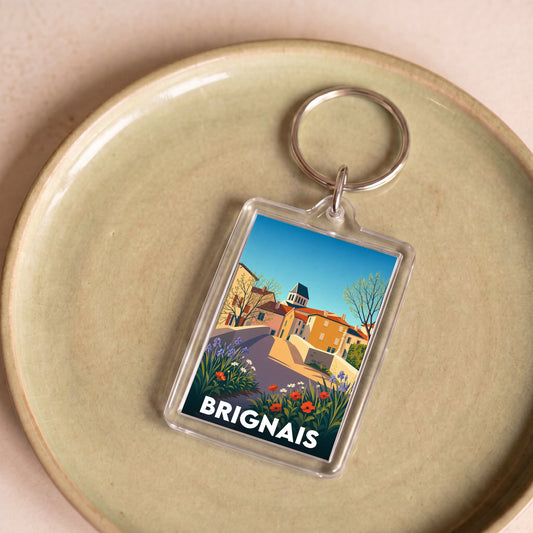 Porte-clés souvenir de la ville de Brignais avec une illustration stylisée.