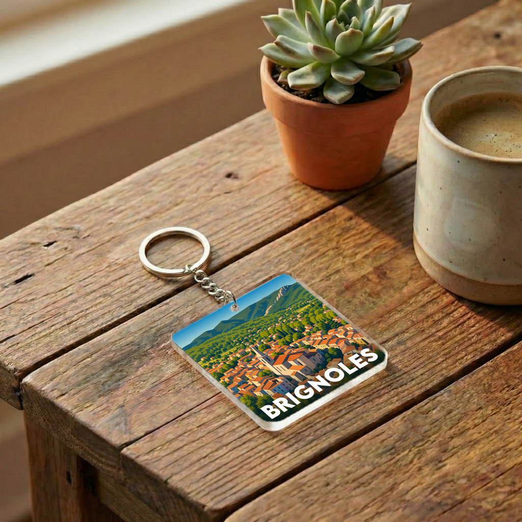 Porte-clés souvenir de la ville de Brignoles avec une illustration stylisée et colorée.