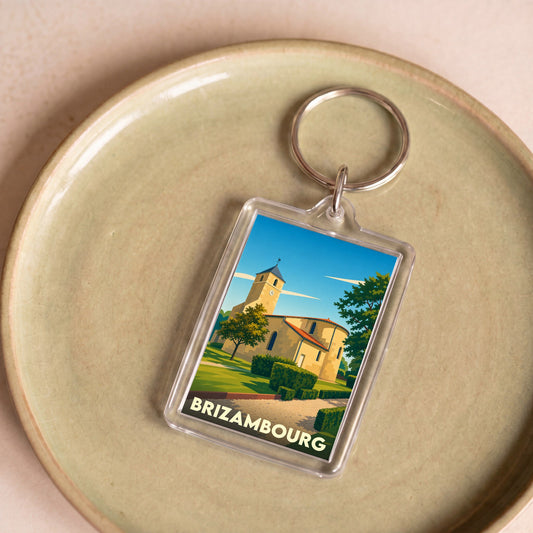 Porte-clés souvenir de la ville de Brizambourg avec une illustration stylisée de son église.