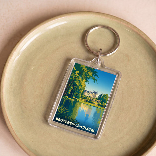 Porte-clés souvenir de la ville de Bruyères-le-Châtel avec une illustration stylisée de son château.