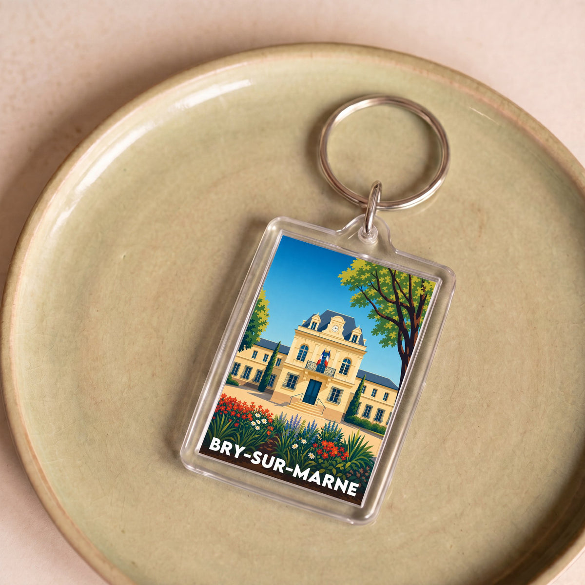 Porte-clés souvenir de la ville de Bry-sur-Marne avec une illustration stylisée.