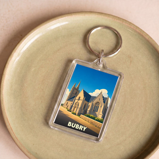 Porte-clés souvenir de la ville de Bubry avec une illustration stylisée de son église.