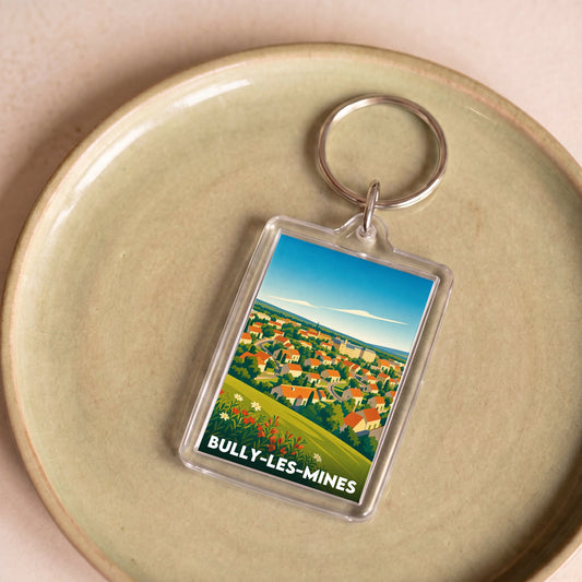 Porte-clés souvenir de la ville de Bully-les-Mines avec une illustration stylisée.