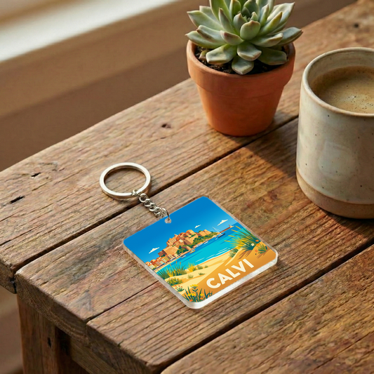 Porte-clés souvenir de la ville de Calvi avec une illustration stylisée de son paysage côtier.